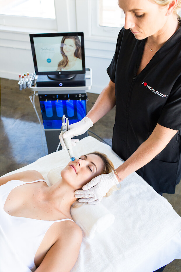 HydraFacial procedure being performed on woman
