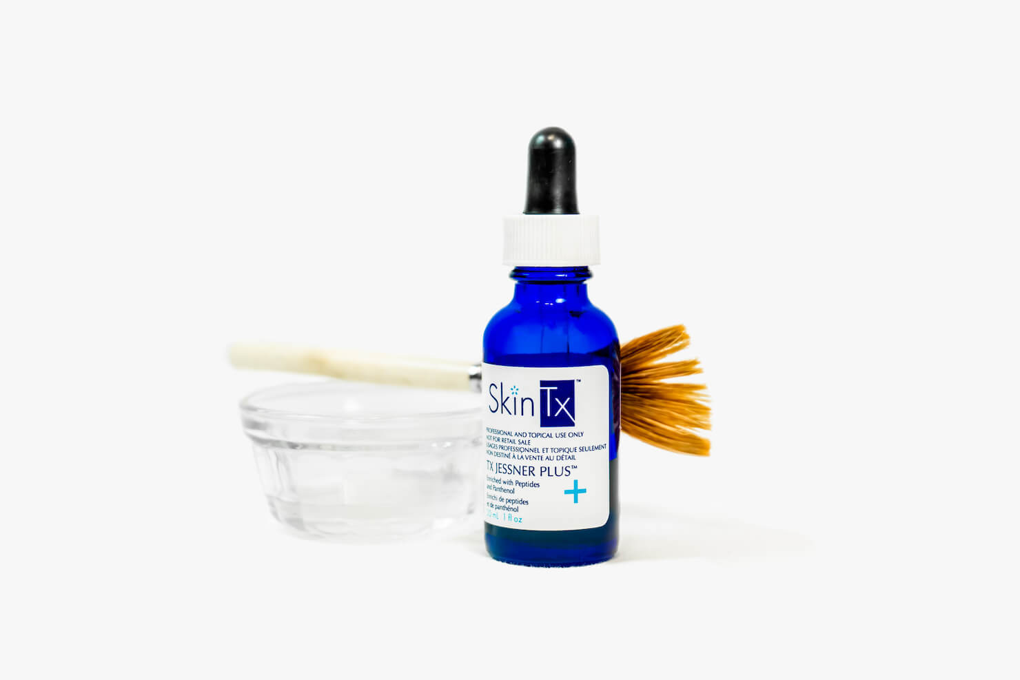 Jessner peel product bottle with liquid and brush