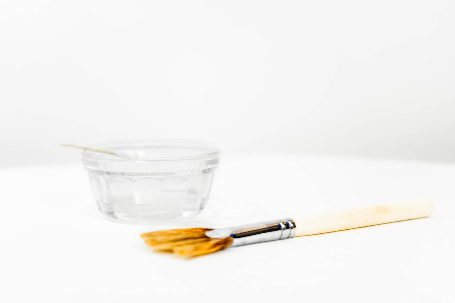 Surrey chemical peel cup with acidic liquid and fan brush
